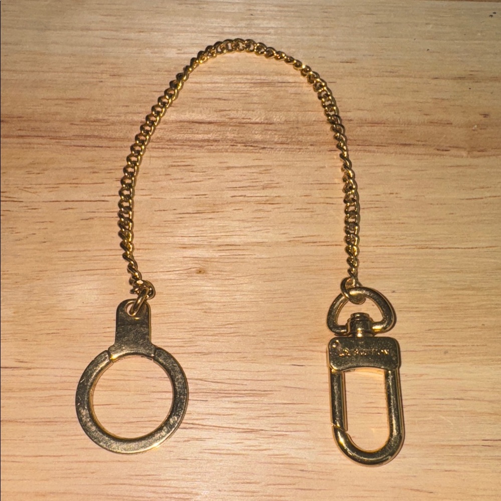 Louis Vuitton brass chain strap purse charm key